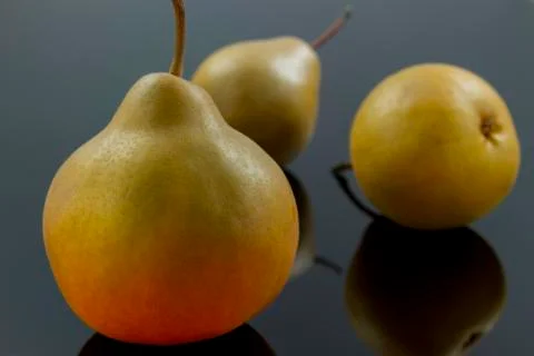 Pears on black Stock Photos