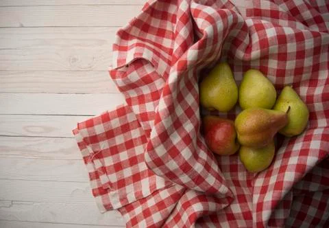 Pears on a checkered fabric Stock Photos