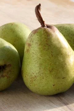 Pears on a chopping board Stock Photos