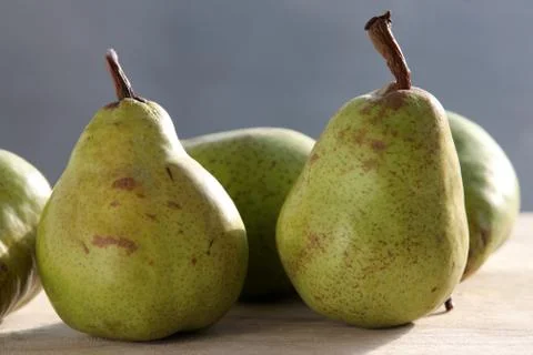 Pears on a chopping board Stock Photos