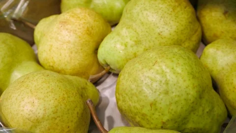 Pears close-up. Fresh pears lying in a box close-up. Stock Footage 310747343