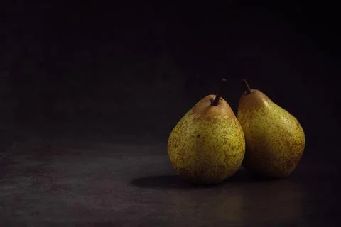 Pears on a dark background Stock Photos