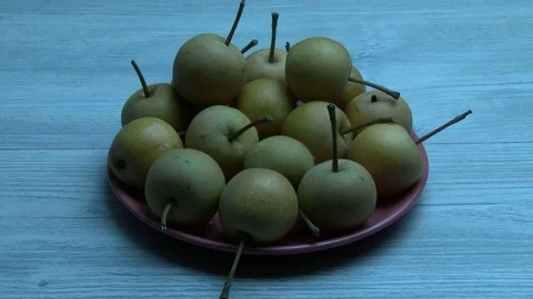 Pears fall on the plate 스톡 동영상 79825594