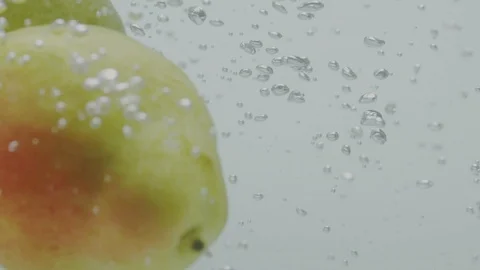Pears falling in water Stock Footage 98300121