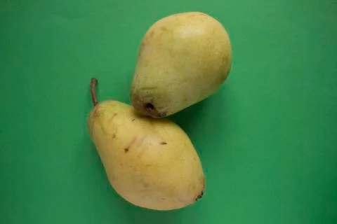 Pears on  green background Stock Photos