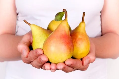 Pears in hands Foto stock