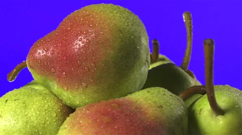 Pears isolated rotating on purple background Stock Footage 62407779