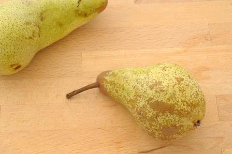 Pears on the kitchen table top view Stock Photos