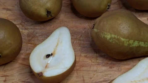 Pears on old cutting board Stock Footage 169082787