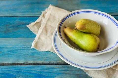 Pears in plate Stock Photos
