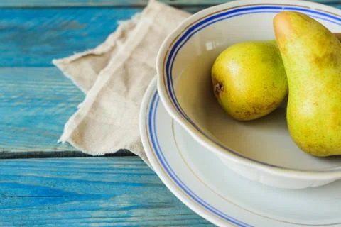 Pears in plate Stock Photos