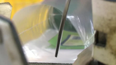 Pears processing line being packed in plastic bags Stock-Footage 64483963