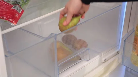 PEARS IN THE REFRIGERATOR Stock Footage 155653520