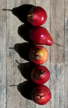 Pears in a row. Top view Stock Photos