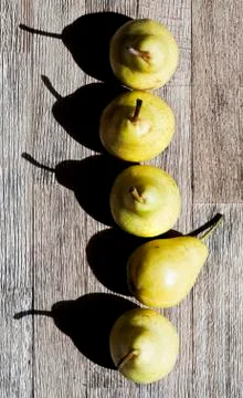 Pears in a row. Top view Stock Photos