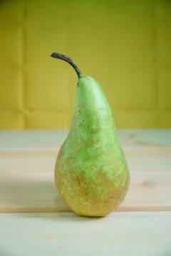 Pears on a rustic wooden kitchen table Stock Photos