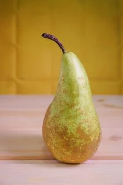 Pears on a rustic wooden kitchen table Stock Photos