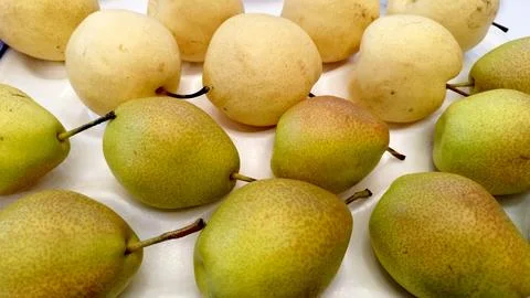 Pears for sampling at food exhibition Stock Photos