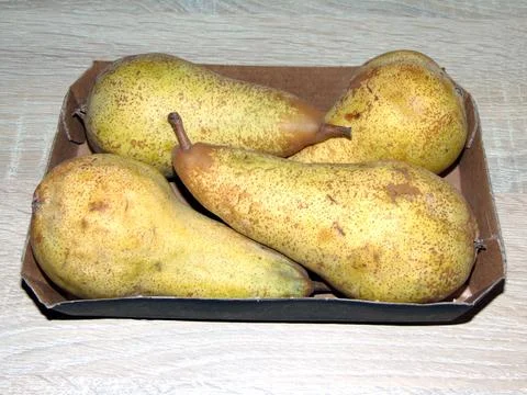 Pears on a wooden background 스톡 사진