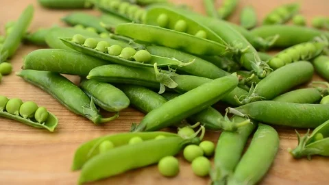Peas on a board. Stock Footage