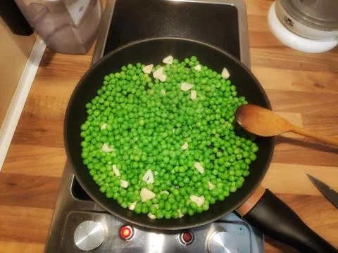 Peas Cooking in a Pan 写真素材