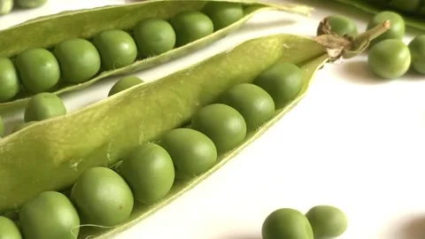 Peas falling footage Stock Footage 236574090