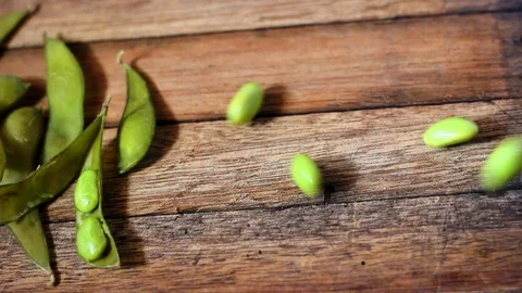 Peas hand pouring3 Stock-Footage 104689174