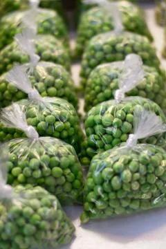 Peas inside plastic bags. Stock Photos