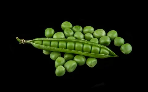 Peas isolated on a black background Stock Photos