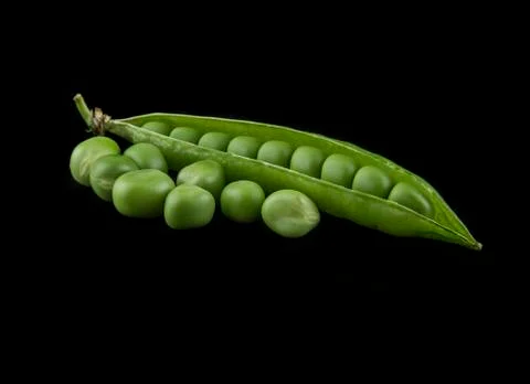 Peas isolated on a black background Stock Photos
