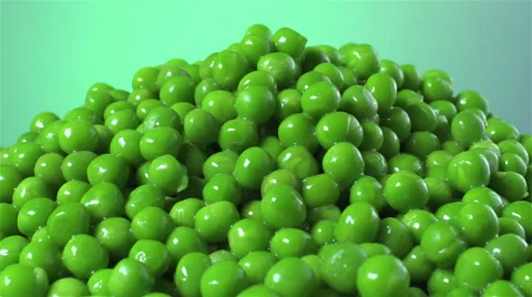 Peas isolated rotating on green background Stock Footage 62392633