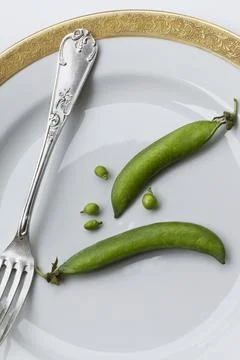 Peas on a plate Stock Photos