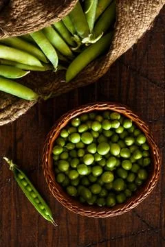 Peas in a Wicker Basket Stock Photos