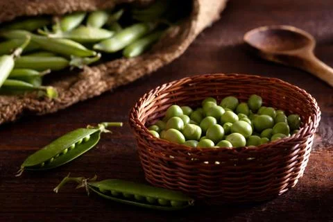 Peas in a Wicker Basket Stock Photos