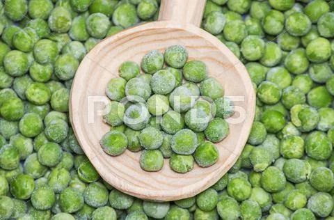 Peas In A Wooden Spoon