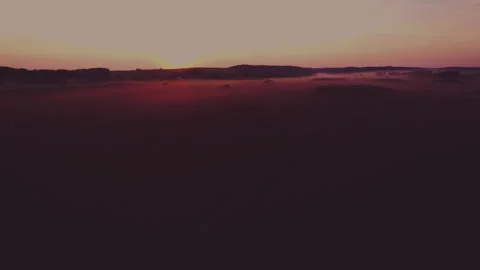Peat extraction site in fog on sunset. 動画素材 207705070