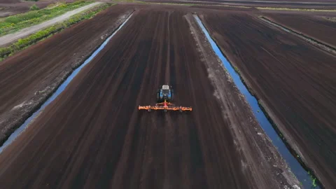 Peat Harvester Tractor on Collecting Extracting Peat. Video stock 213337472