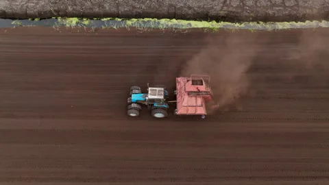 Peat Harvester Tractor on Collecting Extracting Peat. 動画素材 213610333