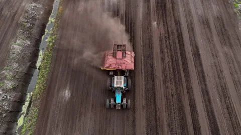 Peat Harvester Tractor on Collecting Extracting Peat. Video stock 213610403