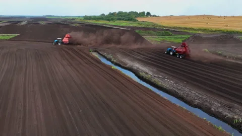 Peat Harvester Tractor on Collecting Extracting Peat. 動画素材 213614528