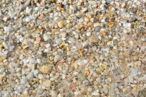 Pebble and waves background, summer vibe Stock Photos