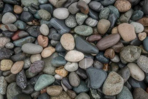 Pebble on beach abstract pattern texture background Stock Photos