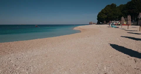 Pebble Beach and Adriatic Coast in Primosten Stock-Footage 336933213