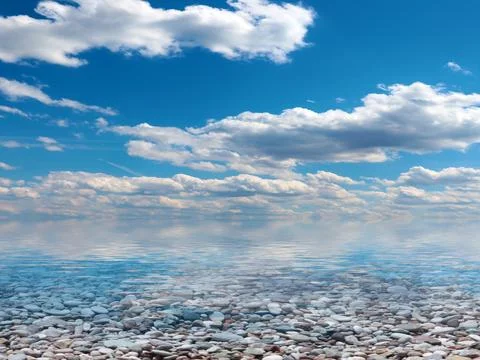 Pebble beach and sky Stockfoto's