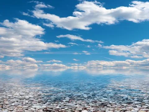Pebble beach and sky 스톡 사진