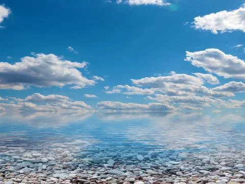Pebble beach and sky Stockfoto's