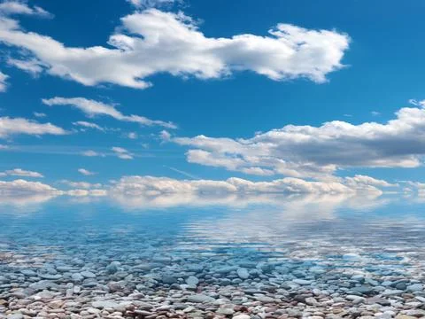 Pebble beach and sky 스톡 사진
