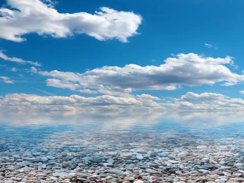 Pebble beach and sky Stockfoto's