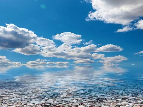 Pebble beach and sky 写真素材