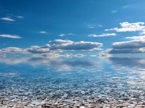 Pebble beach and sky 스톡 사진
